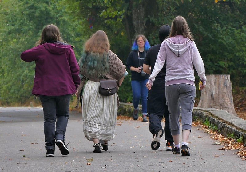 Friends Walking in Park